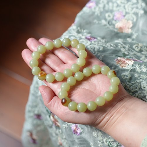 静听松风寒。新疆籽料和田玉青黄玉真皮12毫米圆珠手链串女