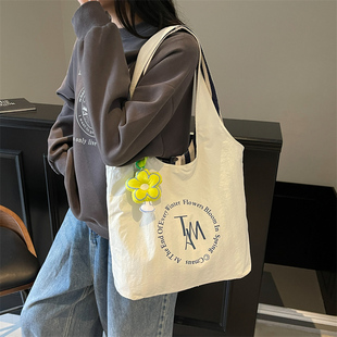 可翻两用包新款女士单肩斜挎包日韩休闲百搭通勤托特包帆布女包包