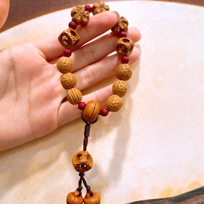 桃核护身手串梅花四通八达朱砂