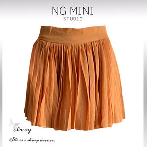 NG Minimalism 新款出游海边度假橘色吸晴百褶短裙A字半身裙女