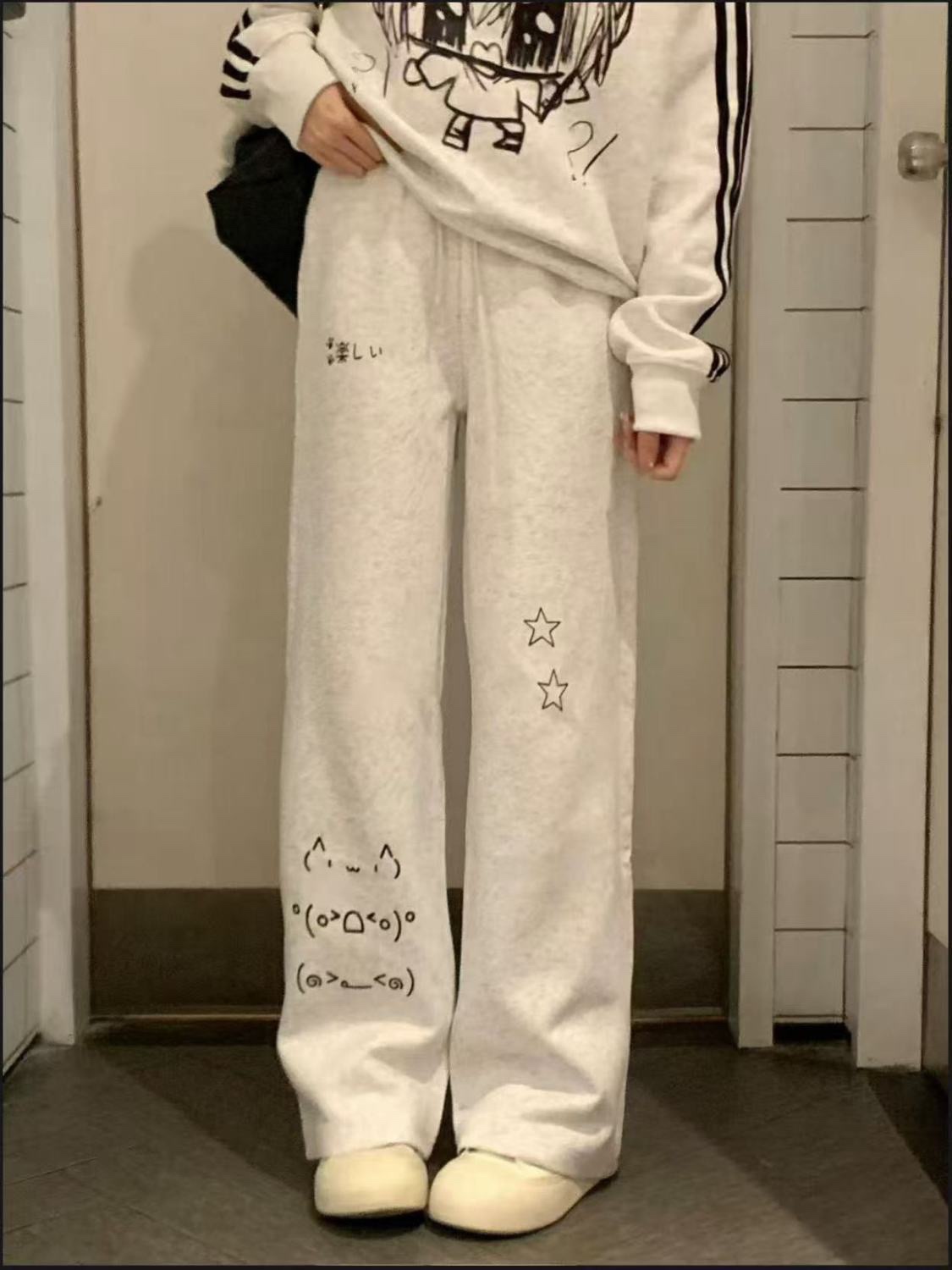 秋冬新款女装可爱卡通印花松紧腰微喇显瘦学生加绒加厚休闲裤