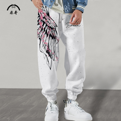 2025新款束脚卫裤男设计感小众翅膀印花休闲裤大码加肥加绒长裤子