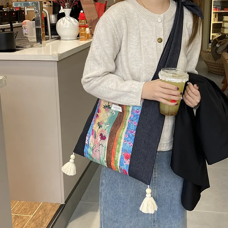 新款小众单肩包女百搭牛仔拼布斜挎包时尚潮流民族风大容量帆布袋