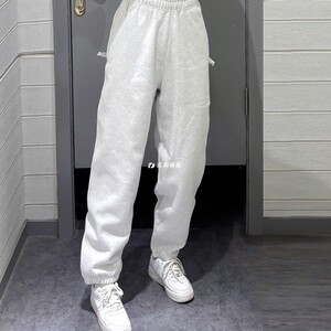 耐克Nike 男子针织舒适透气跑步运动休闲收口束脚长裤 DX1365-386