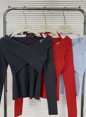 韩系蓝色一字肩挂脖针织衫女秋季设计感小众交叉修身显瘦短款上衣