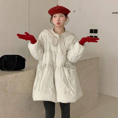 韩版在逃公主风中长款娃娃羽绒服