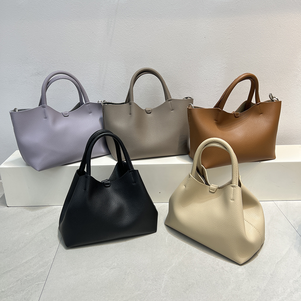 百搭可爱元气减龄手提斜挎水桶包