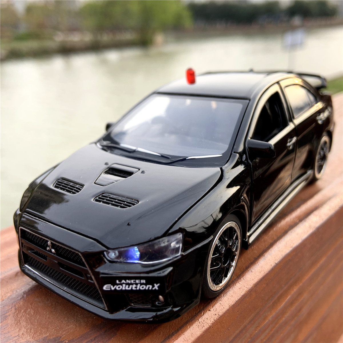 jkm新款1/32三菱evo蓝瑟六开门便衣警车模真人语音声光玩具车模型