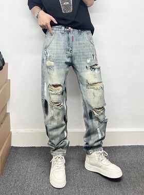夏季男士痞帅涂鸦破洞小脚牛仔裤