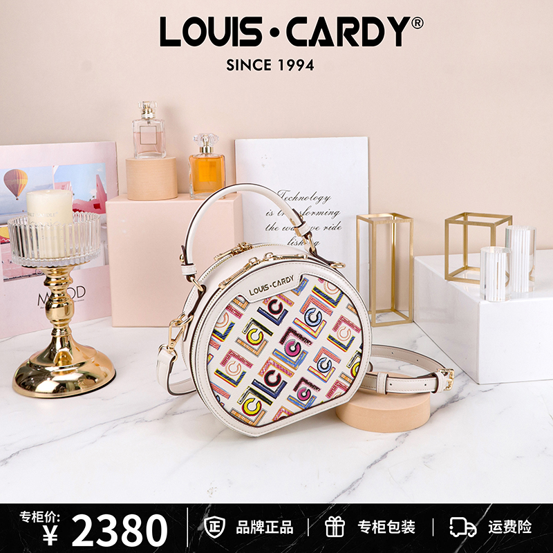 路易卡迪 彩色涂鸦浮雕压花手提斜挎苹果包圆饼包