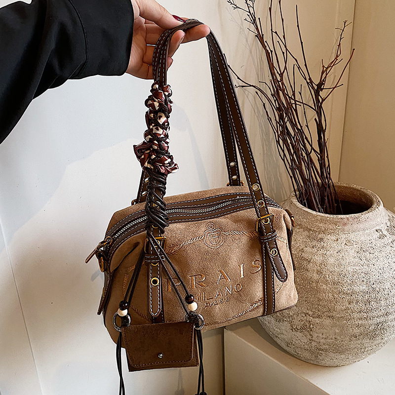 秋冬季复古麂皮绒包包女2025新款时尚百搭斜挎包超火手提包枕头包