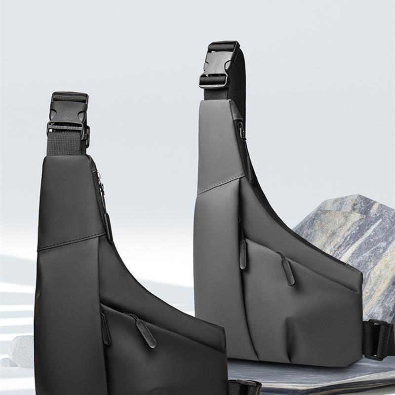 跨境亚马新款逊防盗贴身枪包三角包休闲皮膜男包左右斜挎休闲胸包