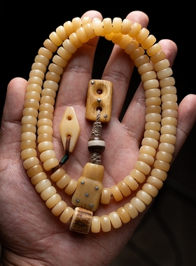 卡杰格朵.驼骨玉化黄料念珠