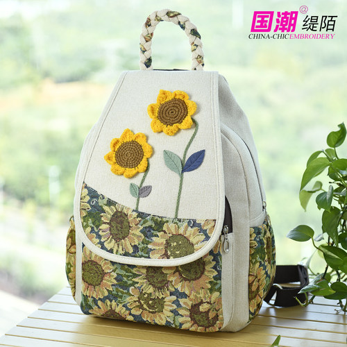 新款民族风双肩包女布艺包轻便