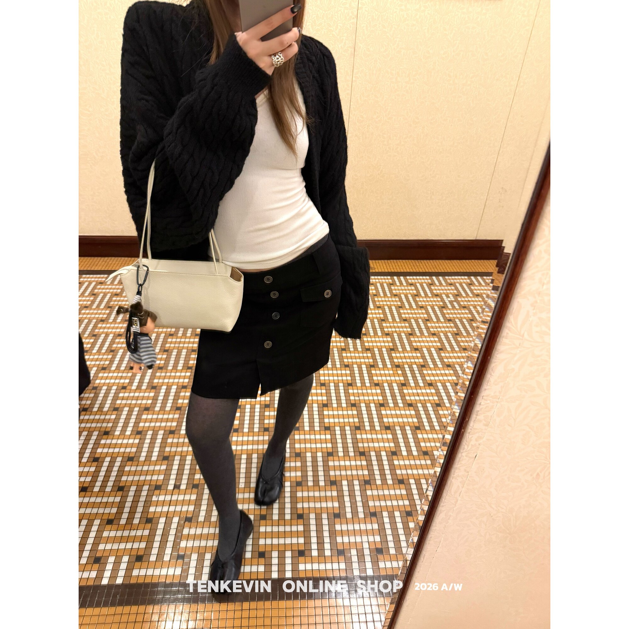 十一石 时髦基调 复古单排扣黑色a字短裙女秋工装口袋显瘦半身裙