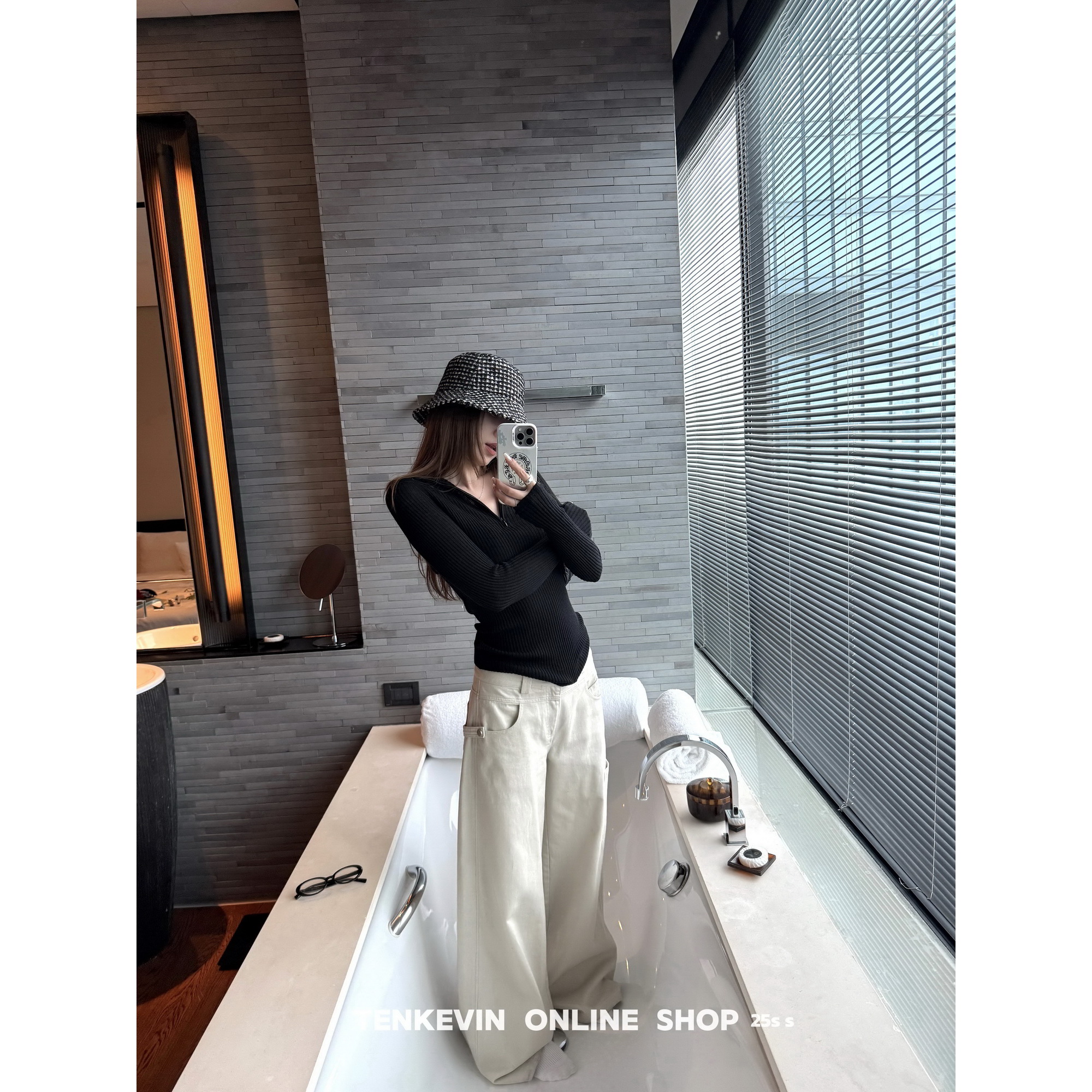 100羊毛半拉链微透坑条针织衫