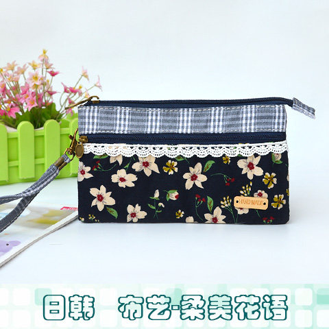小花波点多层帆布手拿包