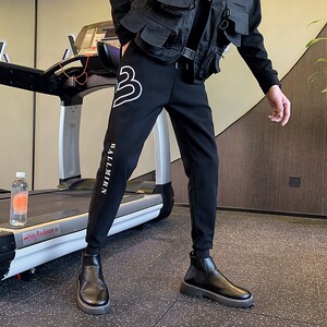 冬季加绒裤子加厚保暖长裤社会小伙网红裤子束脚裤修身小脚裤A158图片