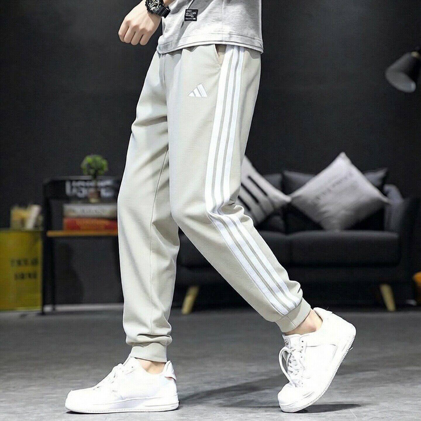 阿迪达斯男装裤子新款休闲百搭运动裤针织加厚防风小脚裤条纹卫裤