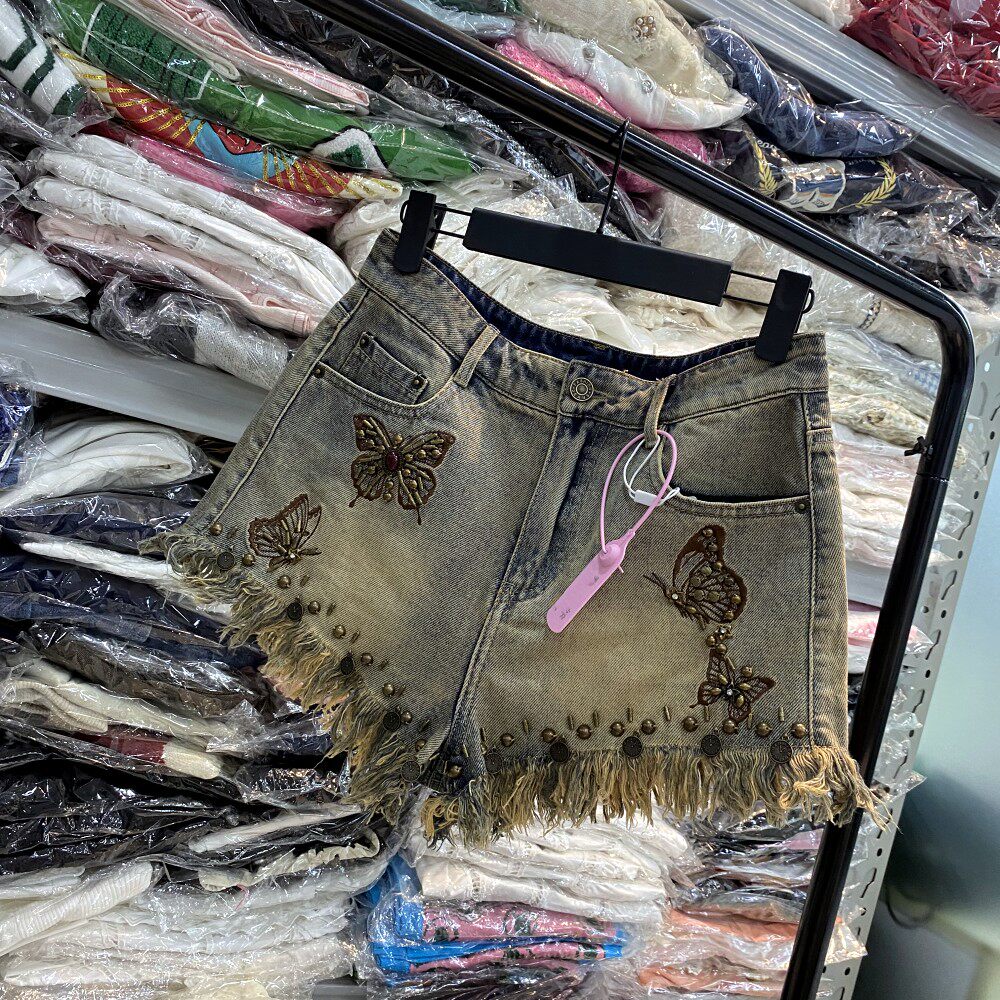 地球店蝴蝶结复古毛边牛仔短裤女