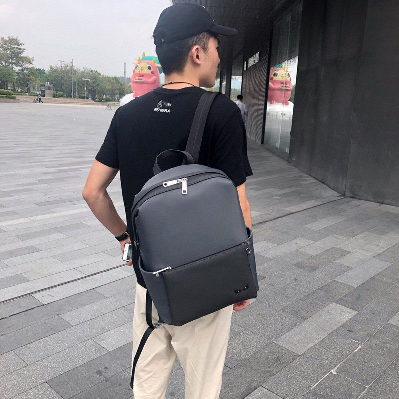 街头潮流尼龙布怪兽旅行包大容量休闲真皮恶魔背包青年眼睛双肩包