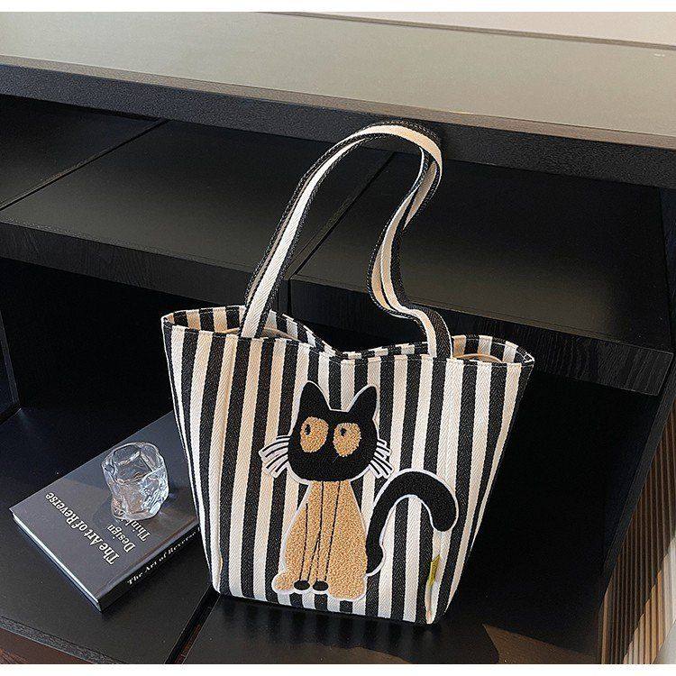可爱卡通米奇包包2024新款女大容量条纹帆布休闲单肩斜跨包水桶包,箱包皮具/热销女包/男包,时尚帆布包,淘宝优惠券,粉丝福利购,淘宝优惠卷