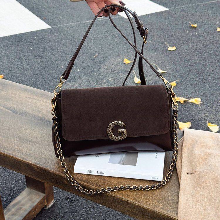 黑色手提腋下法棍包包女2025新款秋冬季轻奢小众高级感单肩斜挎包