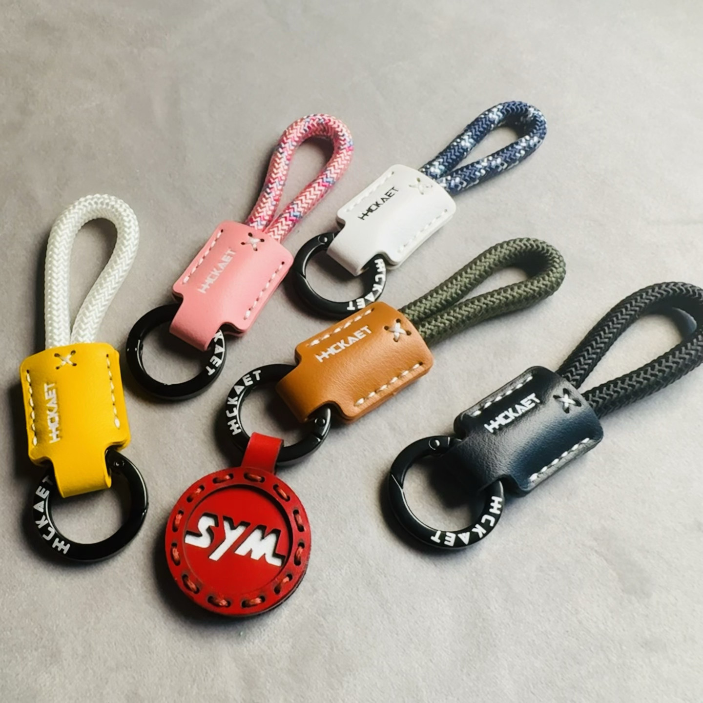 原创女士新款上市男女牛皮金属精品深度三阳摩托车钥匙套挂件