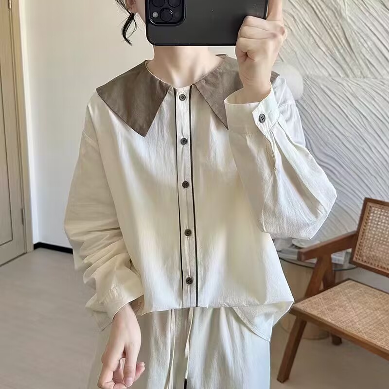 宽松休闲单排扣娃娃领拼色