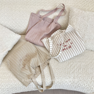 小白兔几 韩国笑脸字母刺绣条纹单肩帆布包大容量逛街购物袋 新款