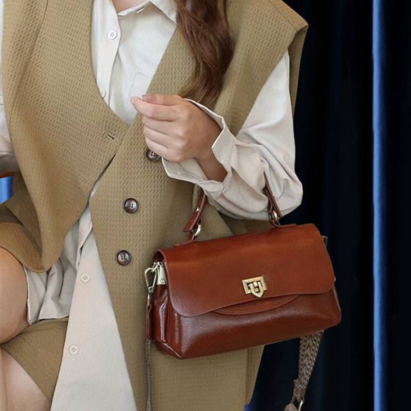 官方正品真皮手提包女2025新款复古气质OL通勤女包宽带时尚多袋单
