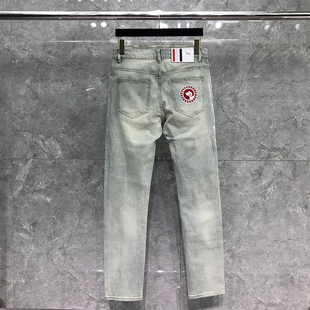 TB牛仔裤男高端夏季薄款浅蓝色小狗标修身水洗小脚休闲牛仔长裤潮
