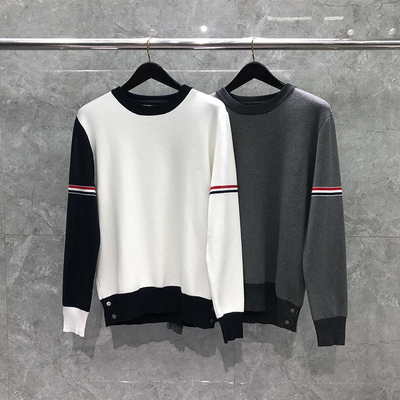 TB圆领双袖红白蓝左右拼色毛衣