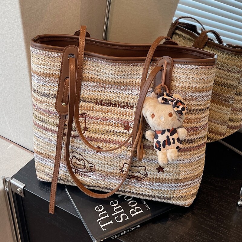 高级感超火编织包包女式2025新款夏季单肩包大容量通勤草编托特包