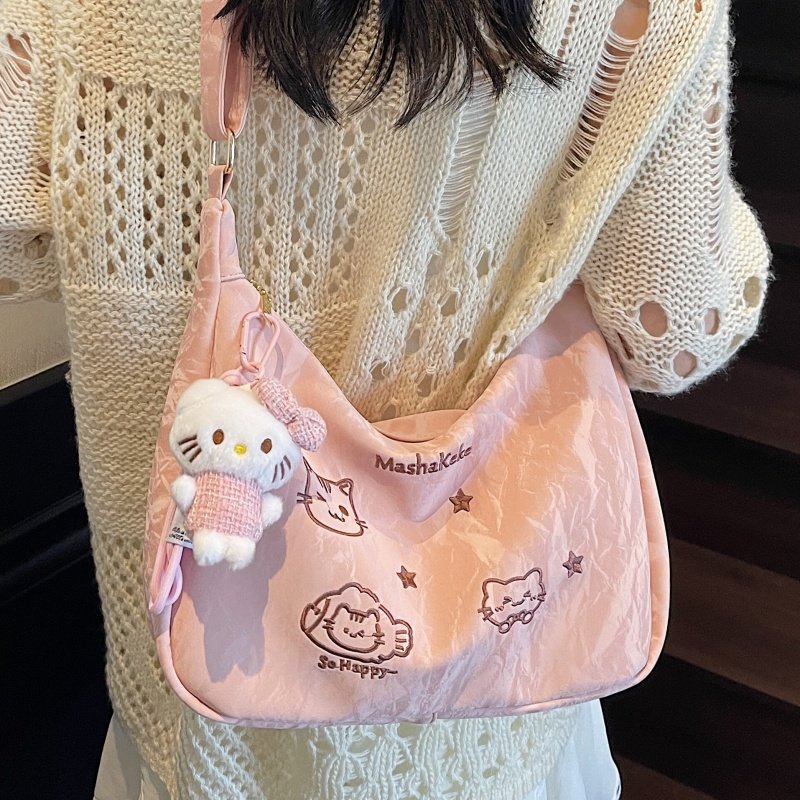 高级感单肩斜挎包包女式2025新款时尚饺子包大容量小众设计托特包