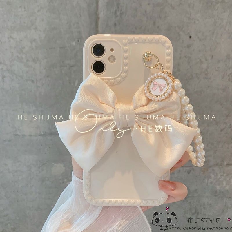 ins气质珍珠蝴蝶结适用iPhone15pro max手机壳16pro手链14plus苹果13/12防摔7plus硅胶se3新款xr防摔8/6/iP11
