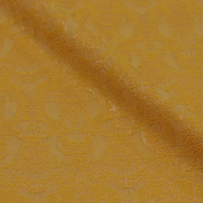 土金色个性浮雕提花布料薄款亲肤有弹力不易皱连衣裙半裙裤子面料
