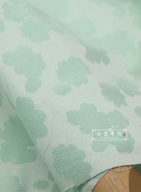 浅绿色立体云朵提花布料春秋款涤棉旗袍西装连衣裙服装光泽感面料
