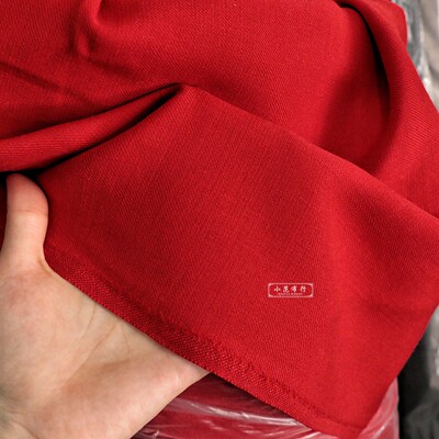 春秋款斜纹高含毛大红色羊毛布料西装套装裤子半精纺马甲半裙面料