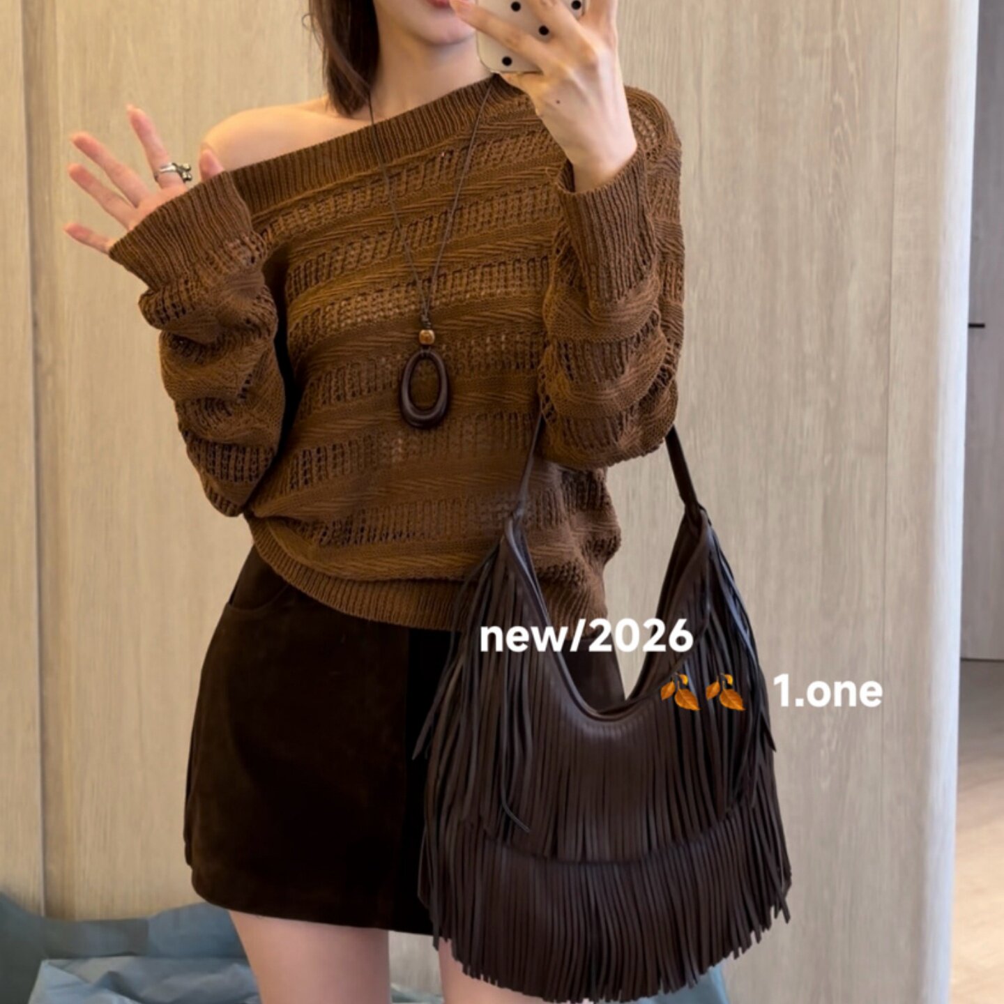涤纶套头斜领长袖针织衫女图片