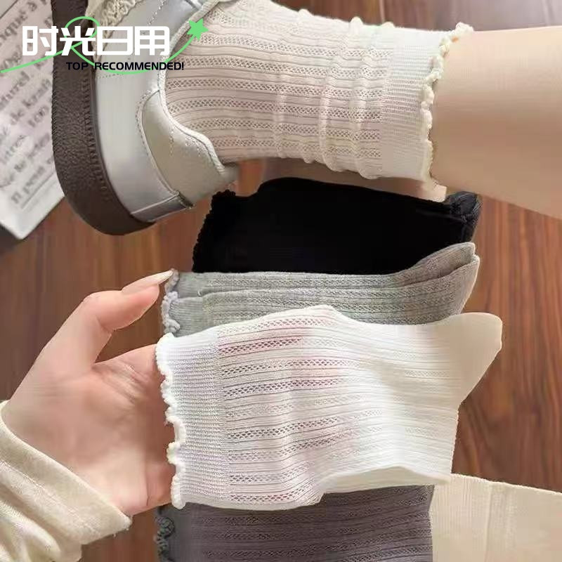 木耳边纯色网眼镂空中筒袜