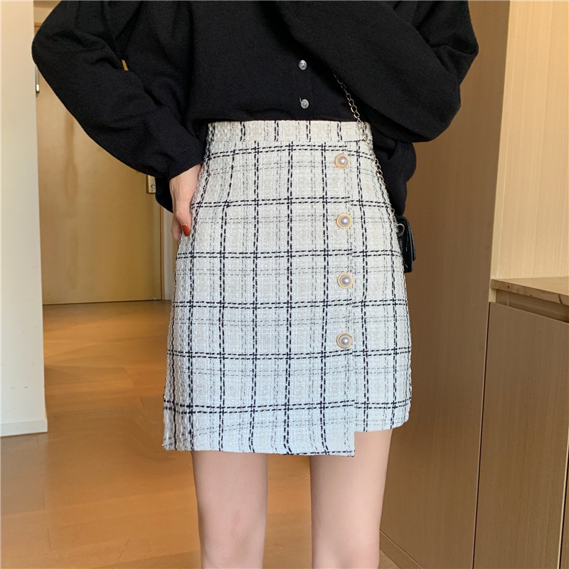 Half length skirt with all kinds of sweaters and coats