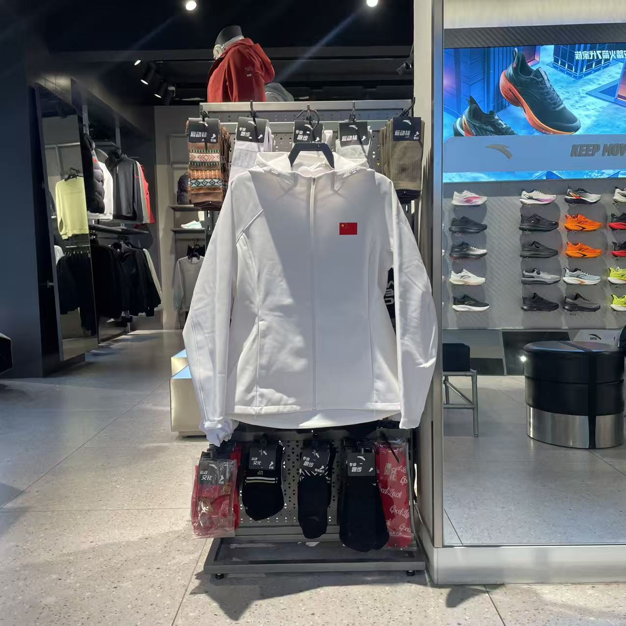 安踏国旗款连帽针织加绒女外套冬