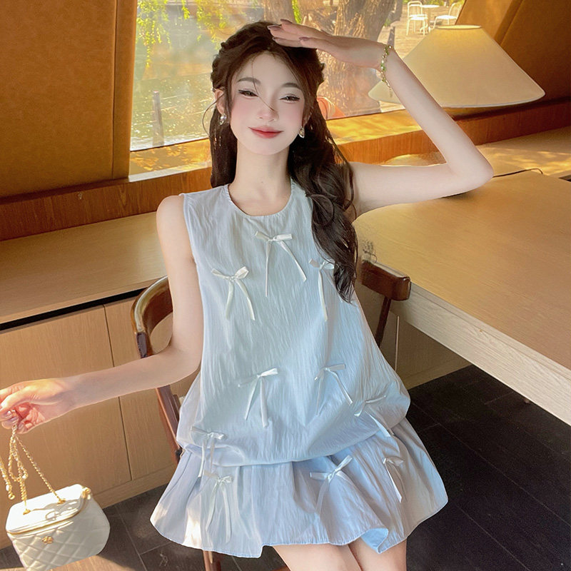 实拍实价2026甜美宽松百搭少女蝴蝶结背心花苞上衣短裙两件套套装
