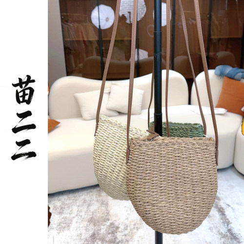 苗二二时尚百搭编织斜挎包拉链女款适合度假沙滩旅游手机包包