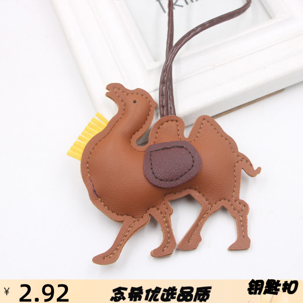 厂家直销沙漠骆驼pu皮革挂绳背包