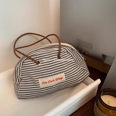 HEYONI韩国手提条纹包女大容量字母化妆包可爱帆布手拎收纳手机包