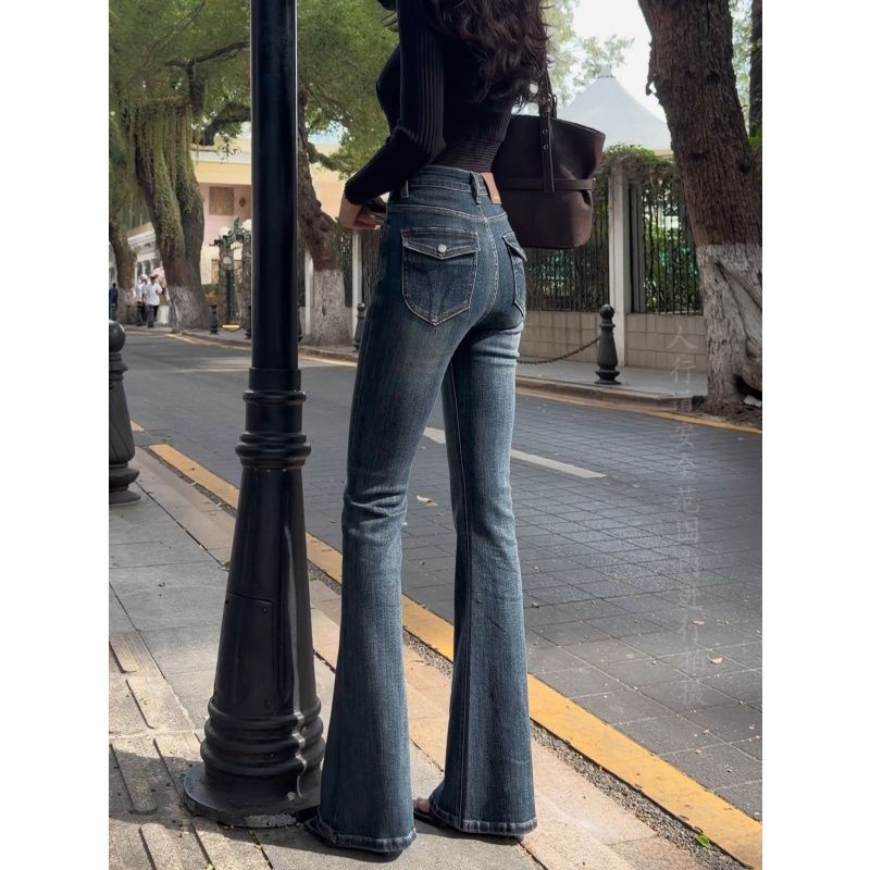 .复古深蓝微喇牛仔裤女高腰翻盖口袋水洗做旧垂顺拖地牛仔长裤子图片