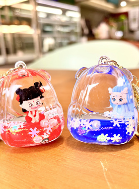 卡通可爱哪吒敖丙入油流沙液体钥匙扣精致书包挂件学生创意小礼品