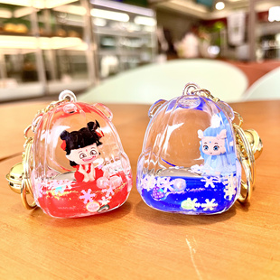 卡通可爱哪吒敖丙入油流沙液体钥匙扣精致书包挂件学生创意小礼品